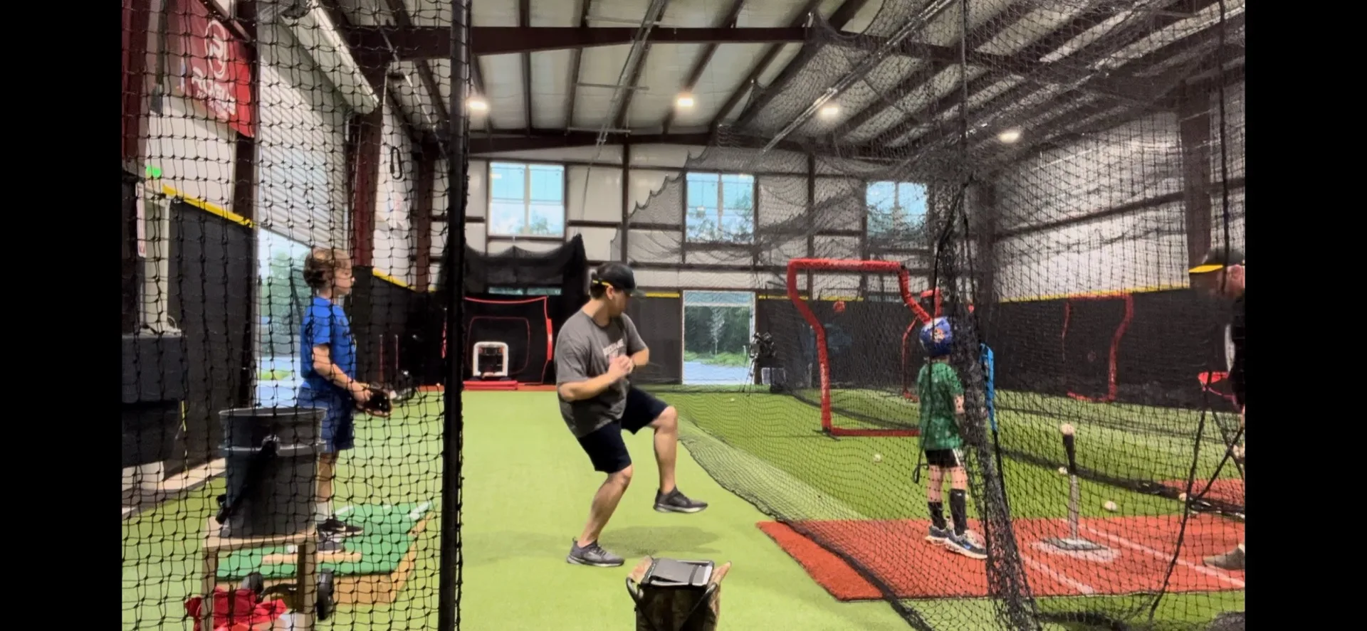 Coach demonstrating an agility and sprint drill